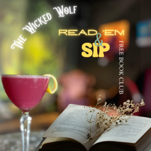 A photo of a pink drink in a Nick and Nora glass, with an open book next to it. There's a dried flower branch on the book. The text reads: The Wicked Wolf Read 'em & Sip! Free Book Club. 